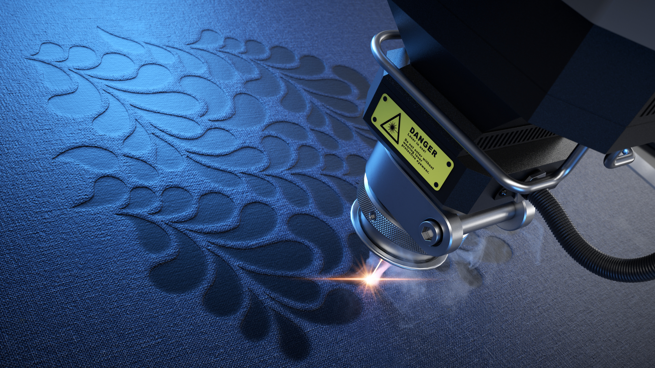 laser engraving machine creating pattern on solid material